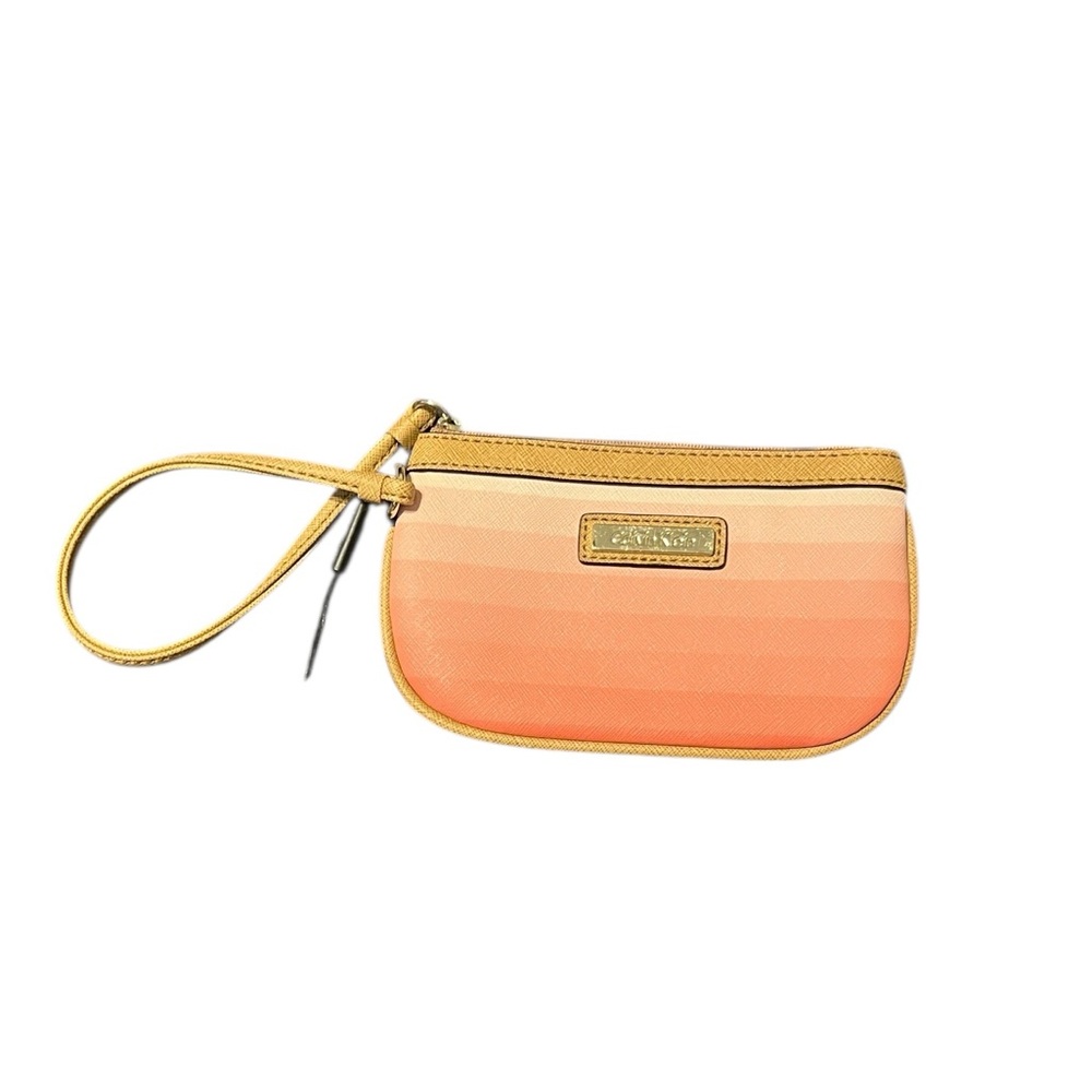 Calvin Klein Coral Ombre Wristlet With Zip Top and Interior Slip Pocket.